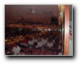 The hall filled with devotees - Click to enlarge