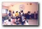 Youth mingling with the patients at Moral Home - Click to enlarge